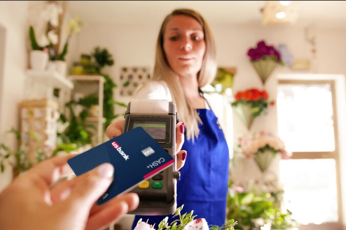 Woman taking payment